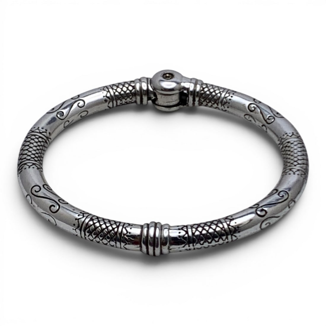 Silver Hinge Bracelet: Silver Hinge Bracelet Featuring A Textured DesignTests Silver - 2 3/8" Inside Width - 40.2 Grams