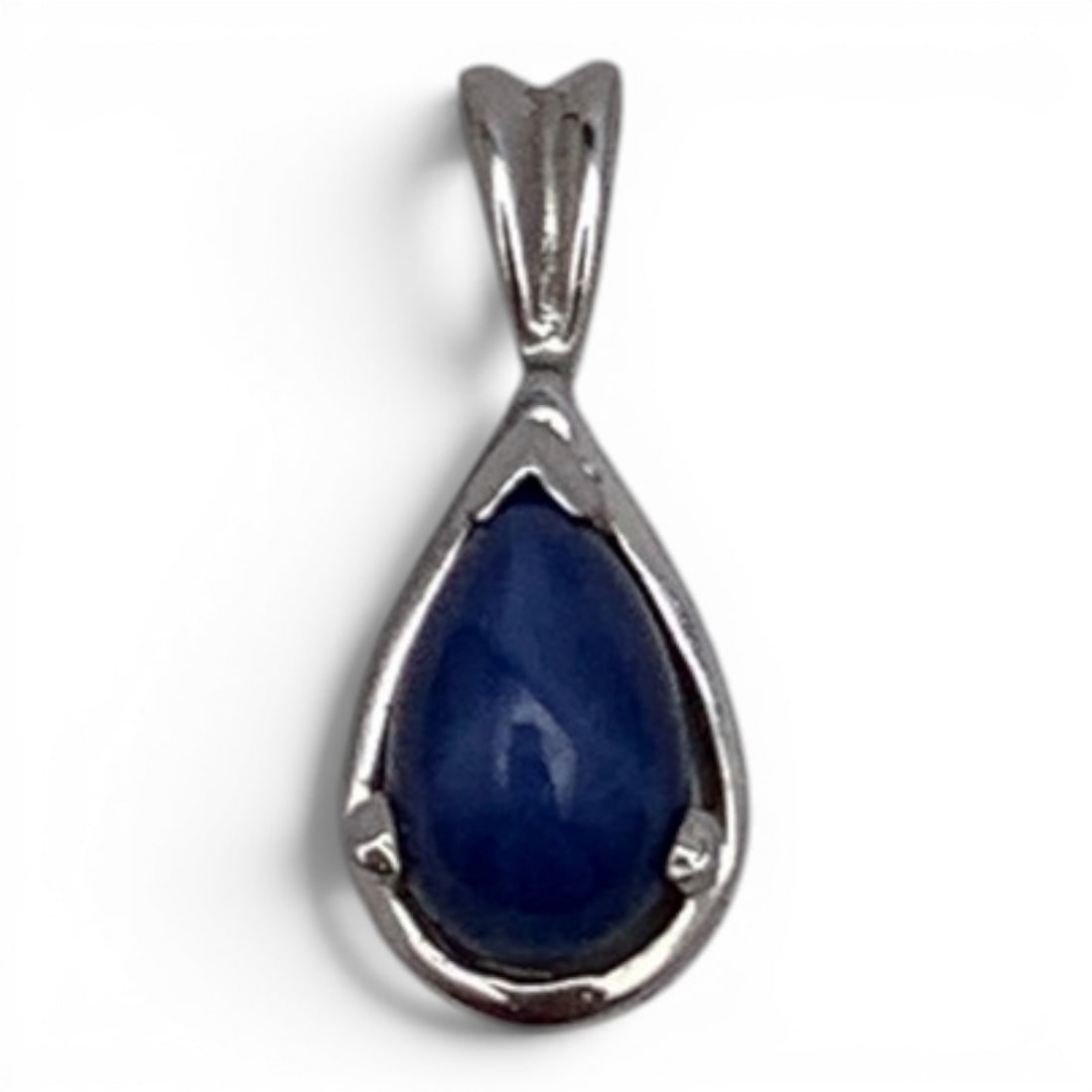 14k White Gold & Star Sapphire Pendant: 14k White Gold Pendant Featuring A Dear Drop Shaped Star Sapphire Stone Marked: 14k - 5/8" Long - 0.6 Dwt