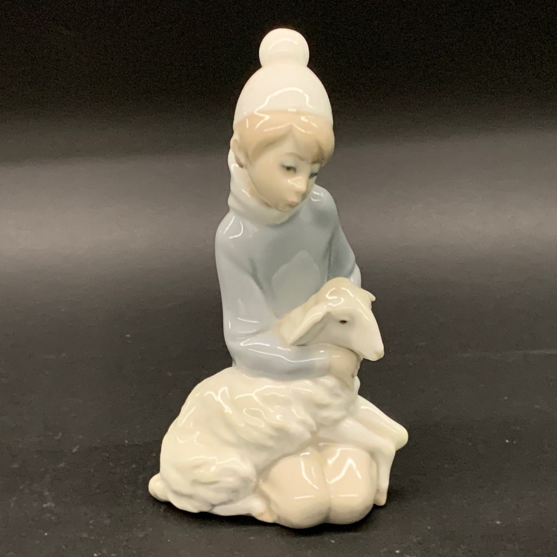 Lladro Porcelain Figurine, Shepherd Boy With Lamb: Lladro Fine Porcelain Figurine Featuring A Young Boy In A Hat Holding A Lamb In His LapMarked On Bottom: Lladro, Hand Made In Spain6" Tall