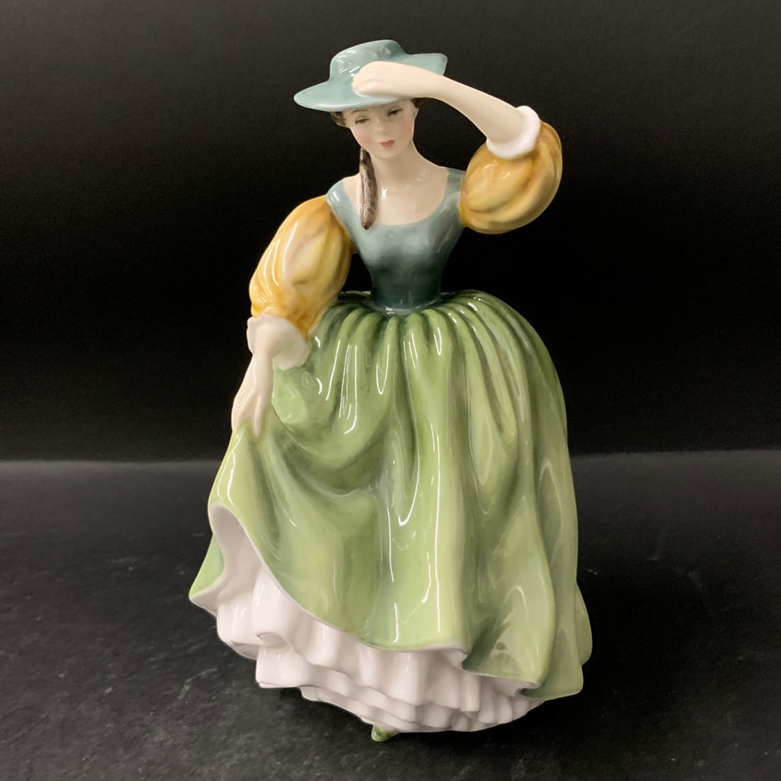Royal Doulton Bone China Figurine, Buttercup: English Royal Doulton Bone China Figurine Titled ButtercupMarked On Bottom: Royal Doulton, Made In England, Bone China, Doulton & Co Limited, Copr 1963, H N 23097 1/4" Tall