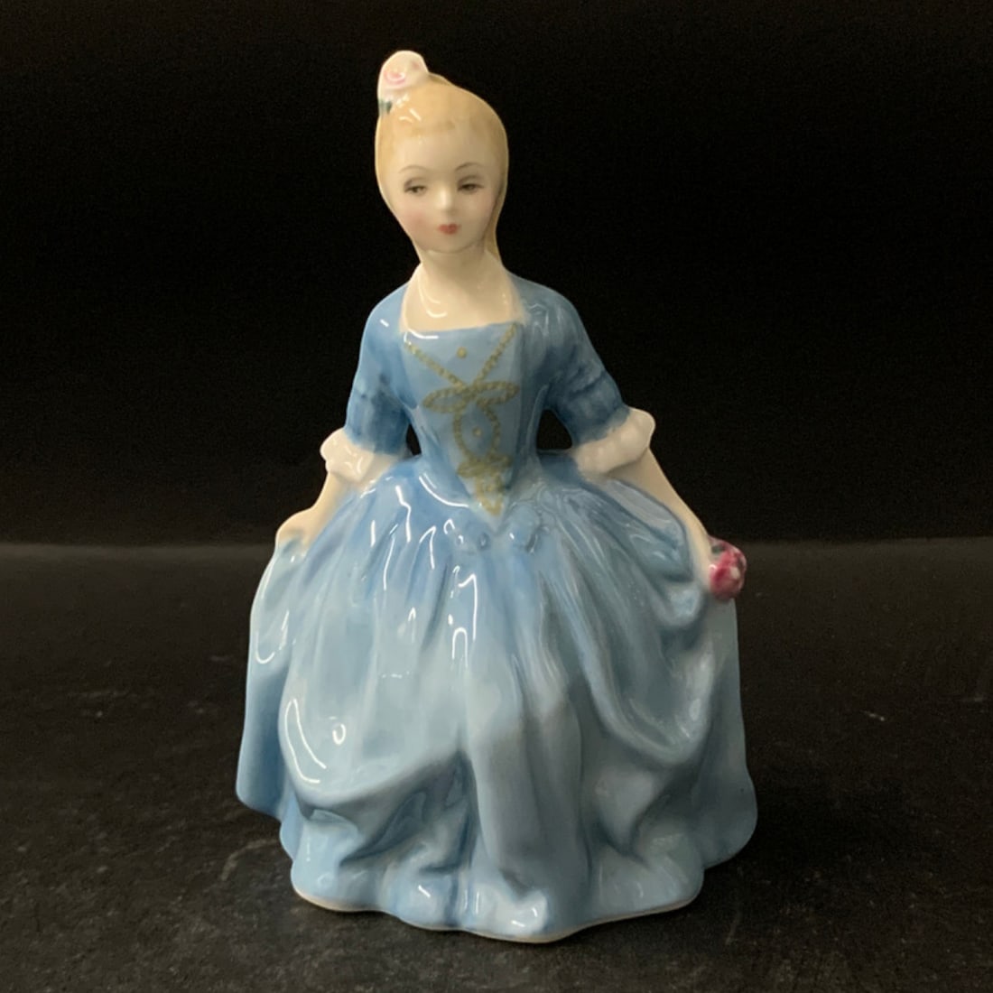 Royal Doulton Bone China Figurine: Royal Doulton Bone China Figurine Titled A Child From WillamsburgMarked On Bottom: Royal Doulton, Made In England, Bone China, Copyright 1963 By Doulton & Co Limited, H N 21545 3/4" Tall
