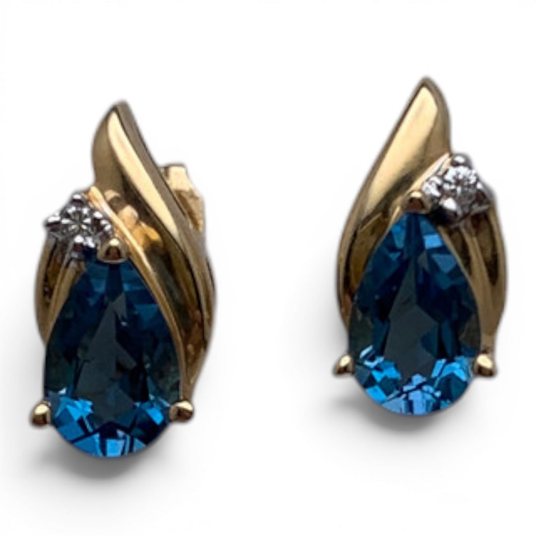 Pair Of 14k Yellow Gold Diamond & Topaz Earrings: Pair Of 14k Yellow Gold Earrings Featuring 1 Center Set Teardrop Cut Blue Topaz Gemstone & 1 Round Cut Diamond Approx. 0.02ct Marked 14k - 1/2" Long - 1.7 DwtGemstones Tested With Presidium Gem