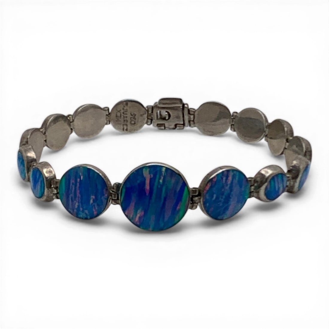 T. Juarez Sterling Silver & Blue Opal Bracelet: T. Juarez Mexico Sterling Silver Bracelet Featuring Blue Opal Stones Set In The Bracelet Marked T. Juarez Mex 925 - 7 3/8" Long - 11.5 Grams
