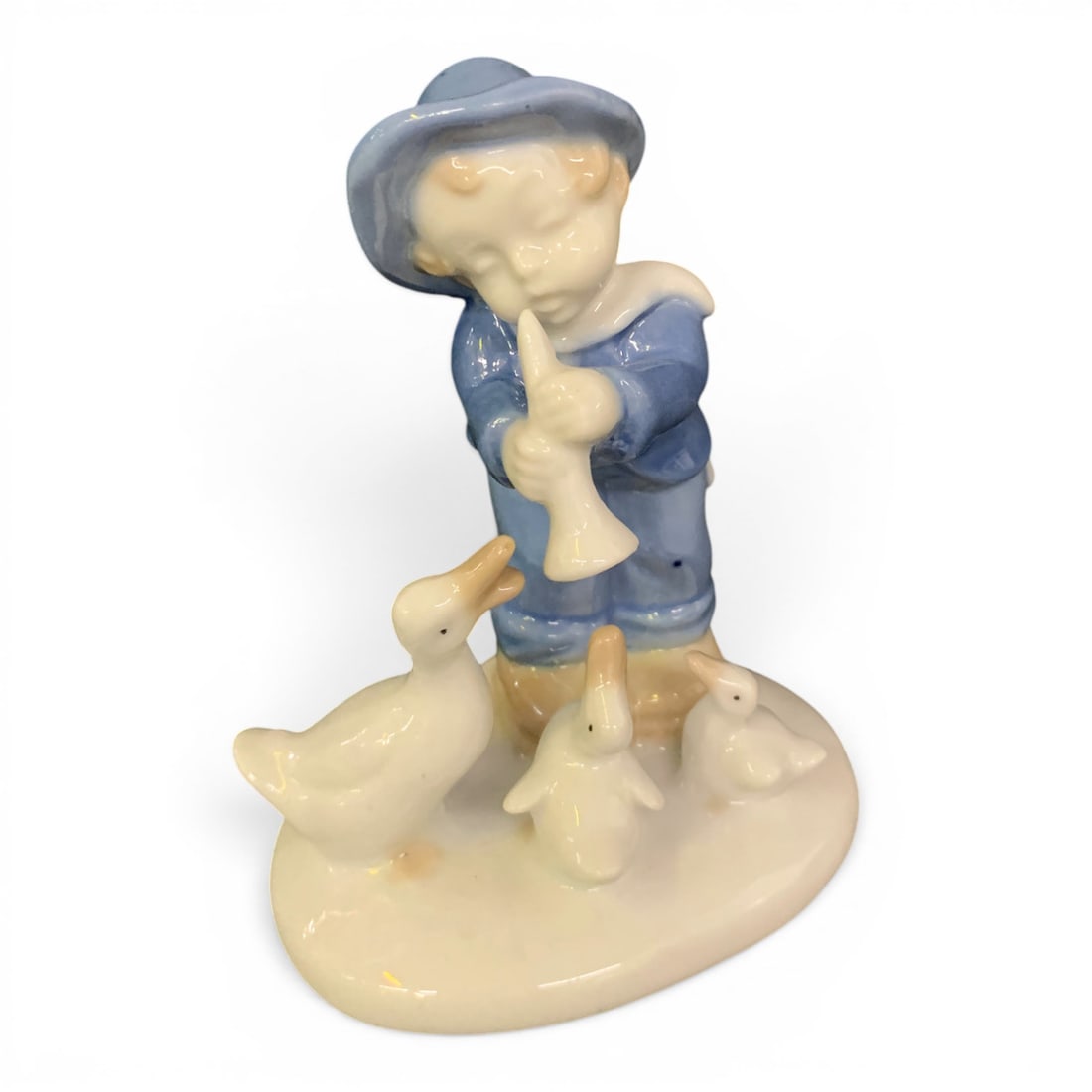 Vintage Lippelsdorf G D R Porcelain Figurine: Vintage Lippelsdorf G D R Porcelain Figurine Titled "boy Playing Horn With Geese"Bears Mark On Bottom: 4 1/2" Tall