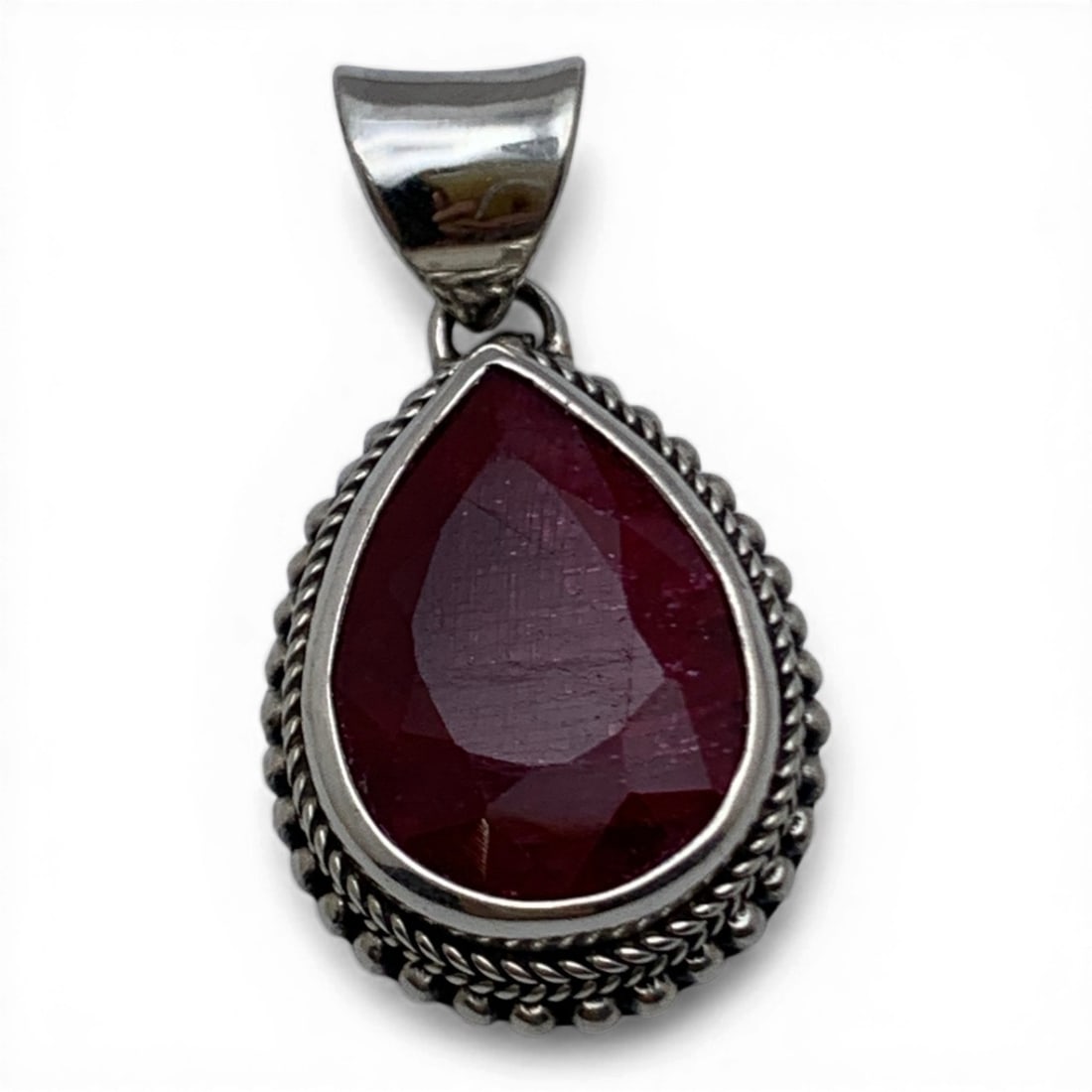 Sterling Silver & Large Ruby Pendant: Sterling Silver Pendant Featuring A Large Teardrop Cut Pink Ruby Marked 925 - 1 3/8" Long - 8.6 Grams