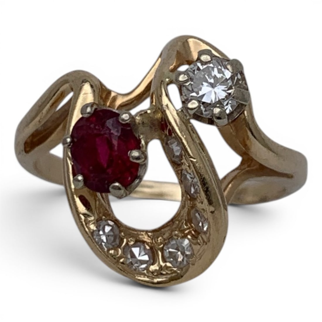 14k Yellow Gold Diamond & Topaz Ring: 14k Yellow Gold Ring With A Wavy Band Design Featuring A Prominent Oval Cut Topaz Gemstone & A Second Prominent Round Cut White Diamond Approx. 0.20ct. Set Along The Band Are 6 Round Cut White Diamond