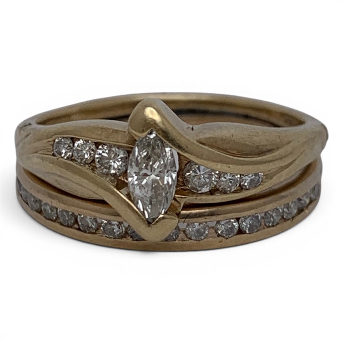 14k Yellow Gold & Diamond Engagement Ring: 14k Yellow Gold Engagement Ring Featuring A Center Set Marquise Cut White Diamond Approx. 0.25ct Each. Channel Set Along The Band Are Round Cut White DiamondsMarked 14k - Size 6.25 - 3.3 DwtGemstones 