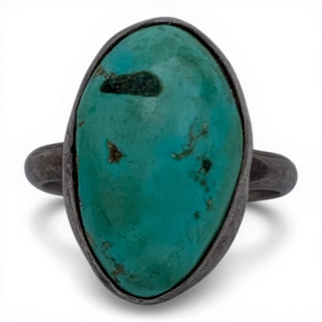 Silver & Turquoise Stone Ring: Sterling Silver Ring Featuring An Oval Shaped Turquoise StoneTests Silver - Size 6 - 4.5 Grams
