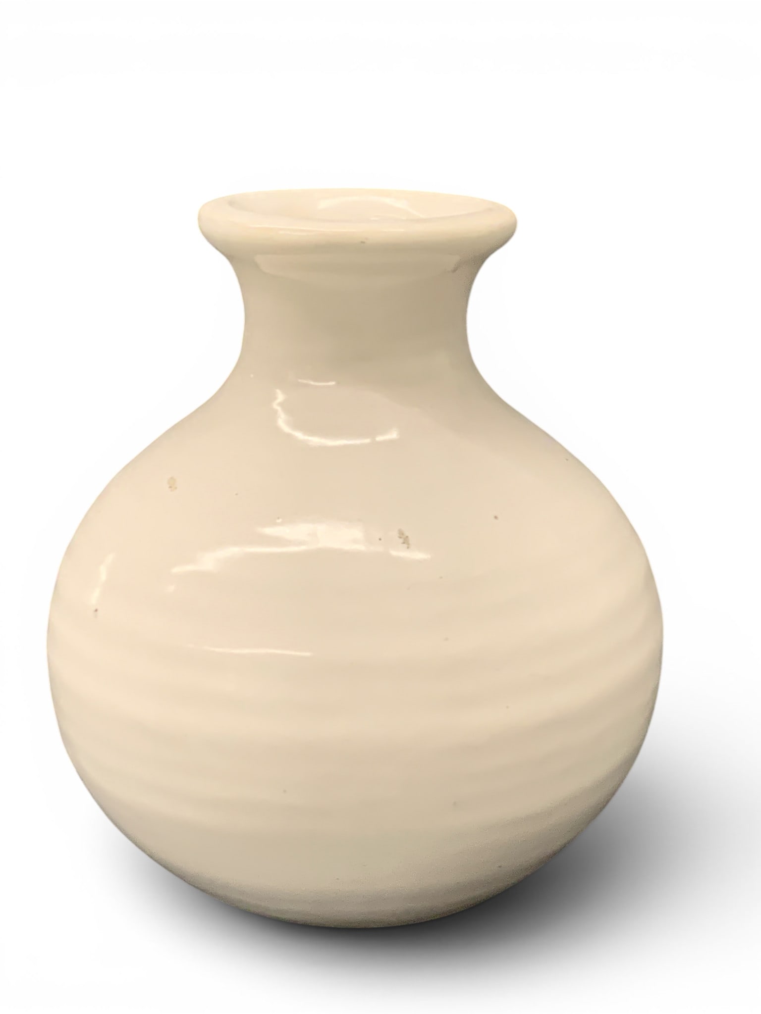 White Ceramic Vase: White Ceramic Vase Featuring A Rounded Silhouette And A Glazed Finsish4 3/4" Tall