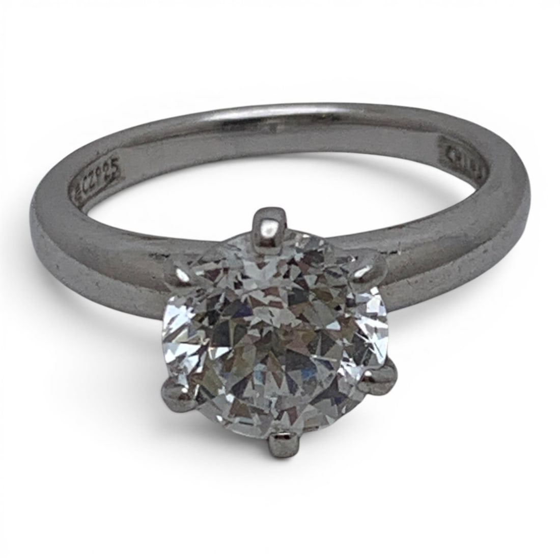 Sterling Silver & Cubic Zirconia Ring: Sterling Silver Ring Featuring A Solitaire Round Cut Cubic Zirconia Clear Stone Marked: 925 Cz - Size 8 - 4.5 Grams