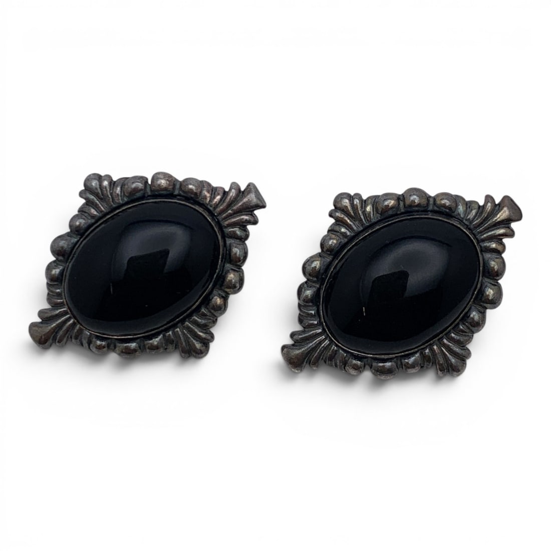 Pair Of Sterling & Black Stone Clip Earrings: Pair Of Sterling Silver Clip Earrings Featuring A Large Oval Black Stone Marked: 925 - 1 1/8" Long - 14.9 Grams