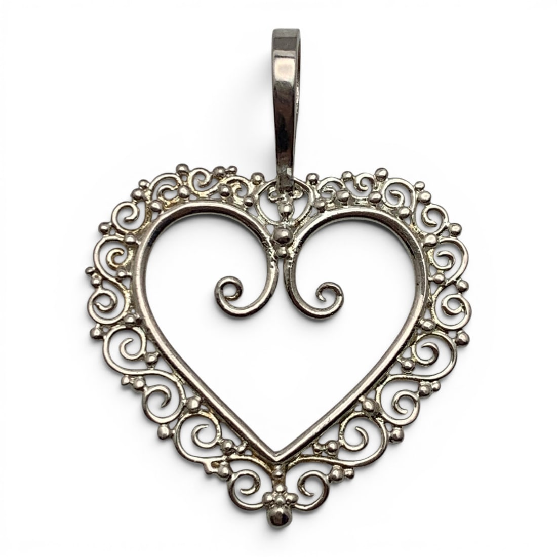 Sterling Silver Heart Pendant: Sterling Silver Heart Pendant Featuring An Open Work DesignMarked: 925 - 1 3/4" Long - 3.7 Grams