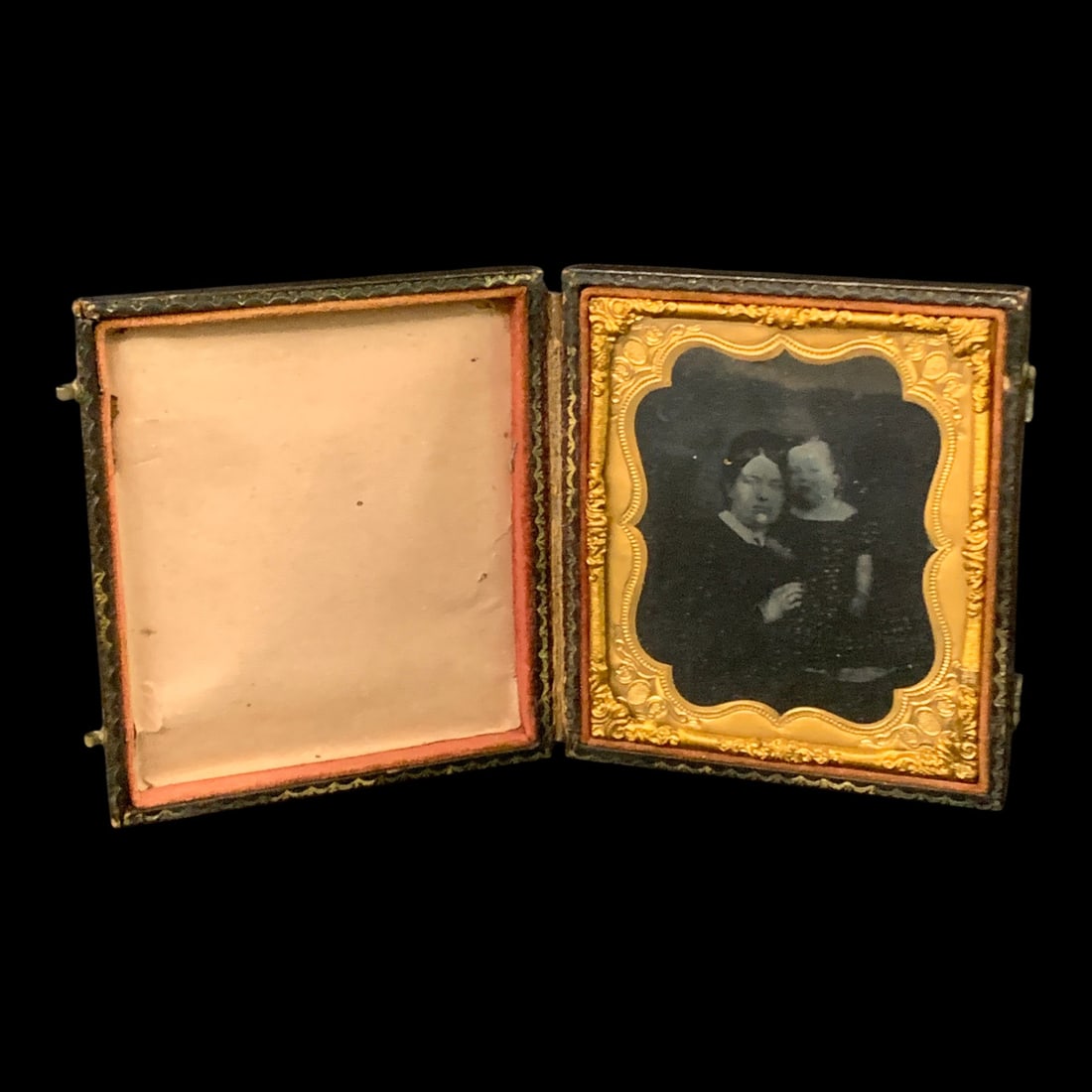 Antique 19th-century Cased Ambrotype: Antique 19th-century Cased Ambrotype Featuring A Portrait Of Two Individuals In A Hinged Case With An Ornate Brass Mad And Preserver3 1/4" X 3 5/8"Shows Wear