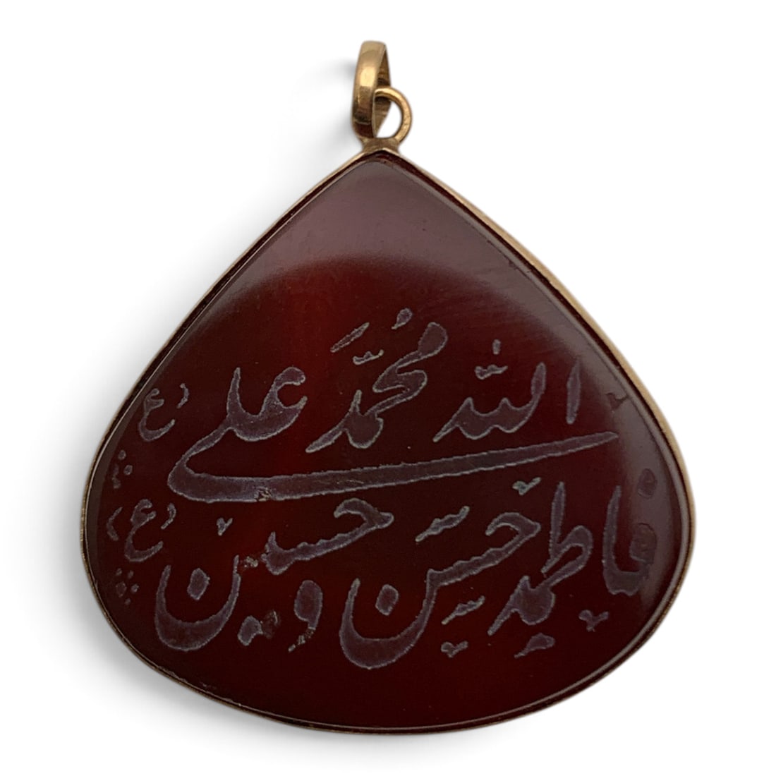 14k Yellow Gold & Carved Red Stone Pendant: 14k Yellow Gold Pendant Featuring A Red Stone Carved With Arabic Lettering Tests 14k - 1 3/8" Long - 3.3 Dwt