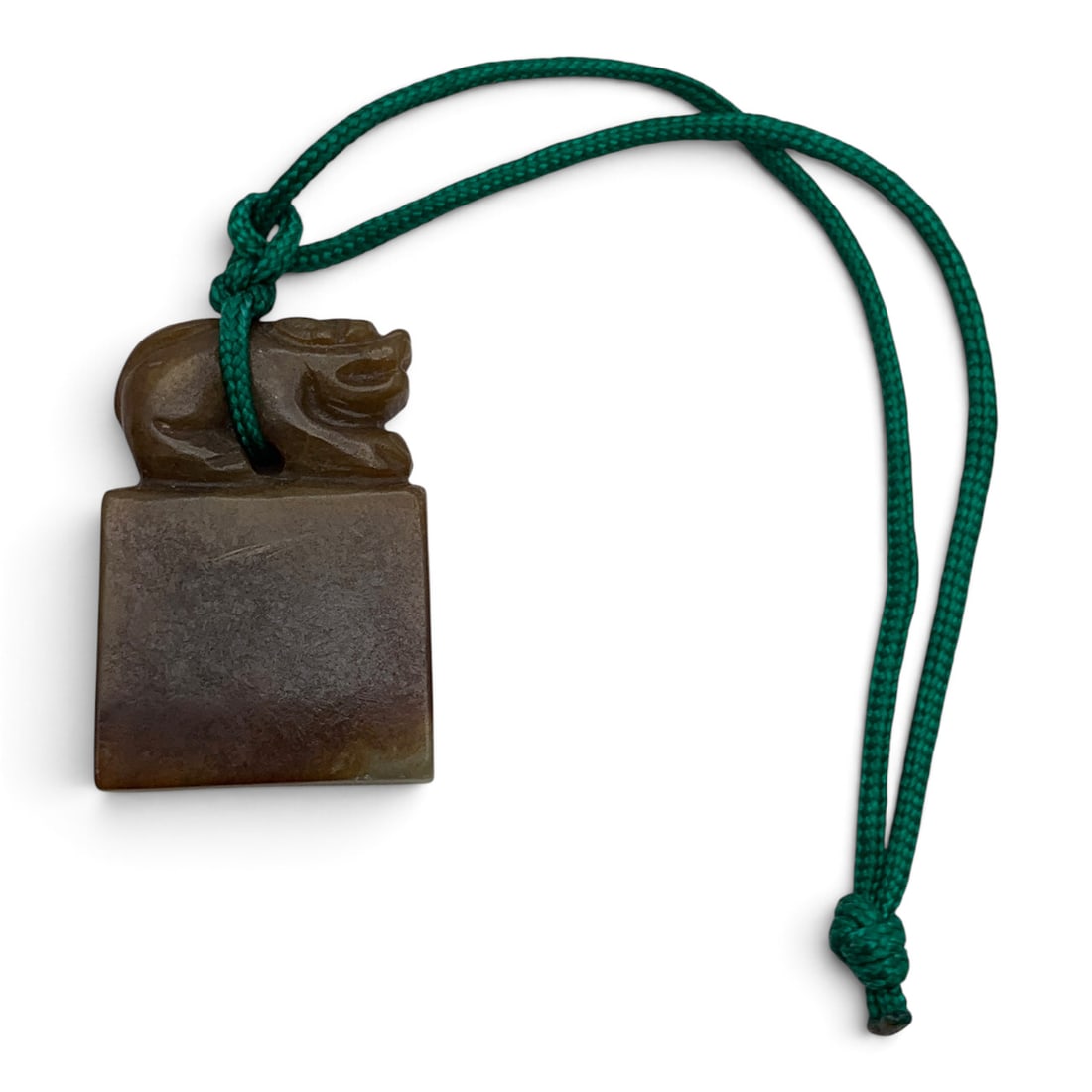 Carved Jade Animal Pendant Bracelet: Carved Jade Pendant Featuring An Animal Sitting Atop A Block On A Green Cord 5 1/8" Length Including Cord