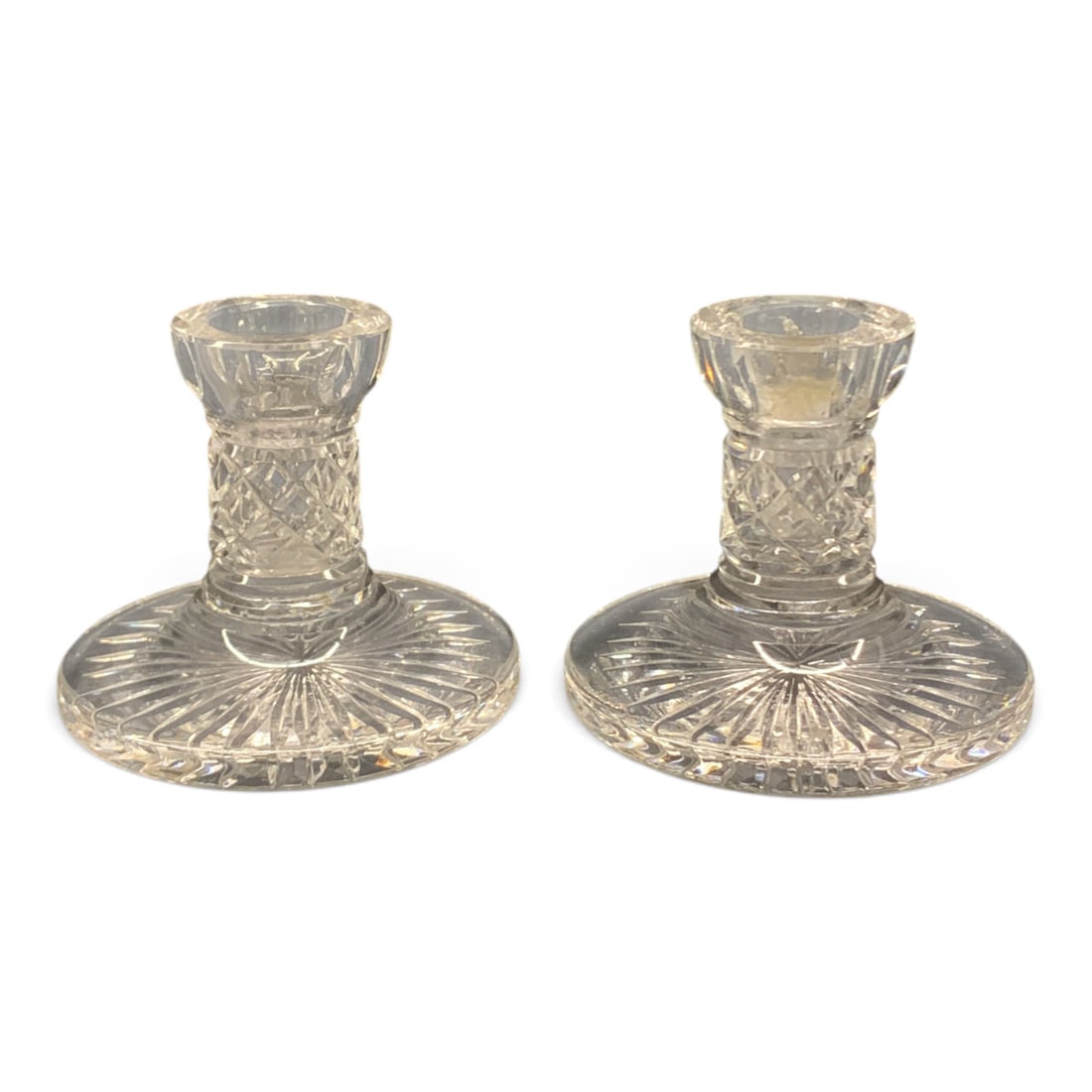 Pair Of Waterford Crystal Candle Stick Holders: Pair Of Waterford Crystal Single-light Taper Candlestick Holders Featuring A Starburst Pattern On The Base And Diamond Cutting Along The StemMarked On Bottom: Waterford - 3 7/8" Tall