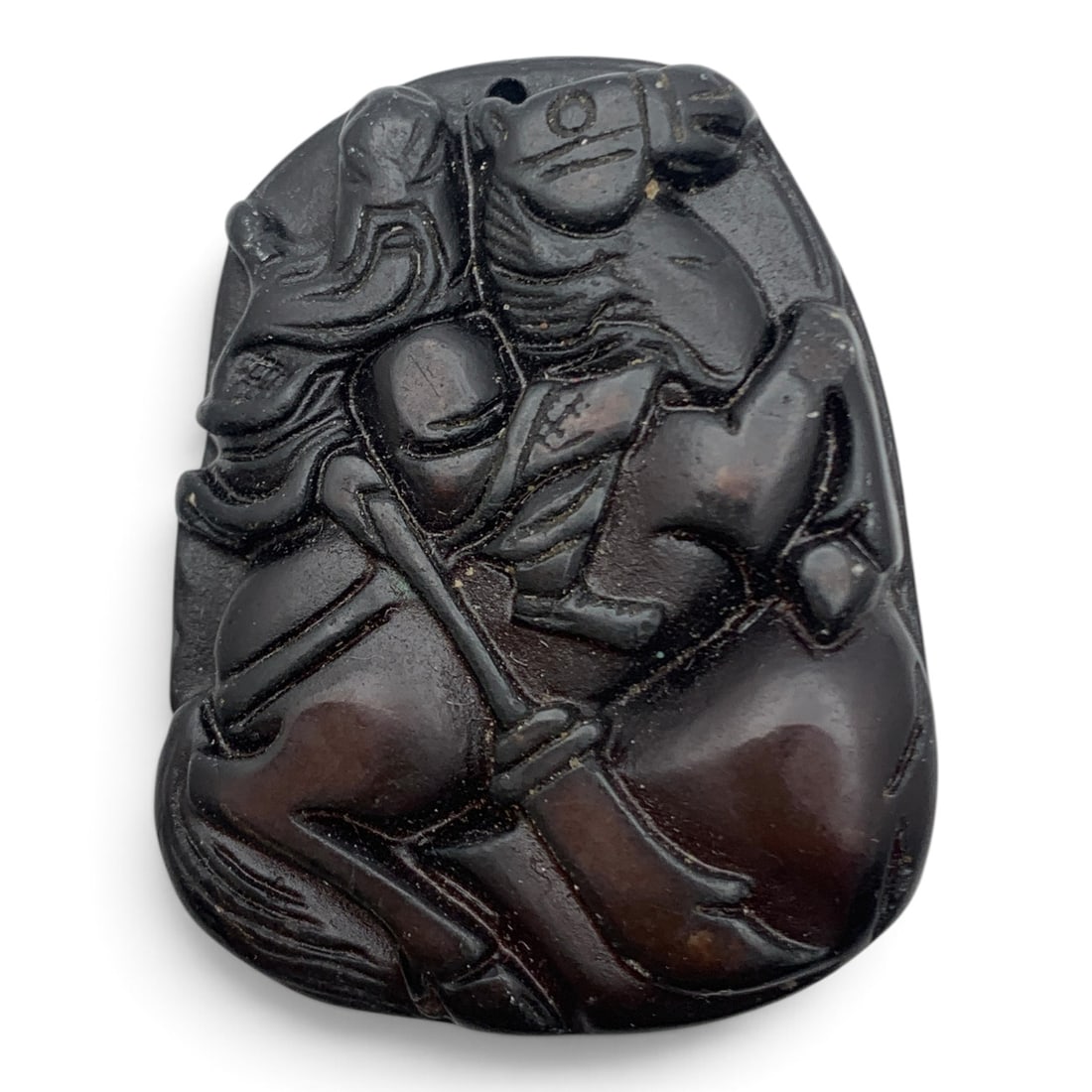 Carved Brown Hard Stone Pendant: Carved Brown Hard Stone Pendant Featuring A Warrior On Horseback1 3/4" Long