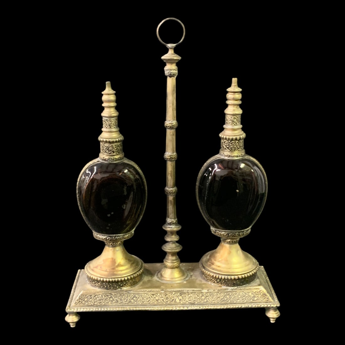 Vintage Moroccan Double Rosewater Sprinkler Set: Vintage Moroccan Double Rosewater Sprinkler Set Featuring Deep Ruby Red Glass Bulbs Mounted In An Orante Metal CaddyStand: 12 3/4" TallBottles: 8 3/4" Tall