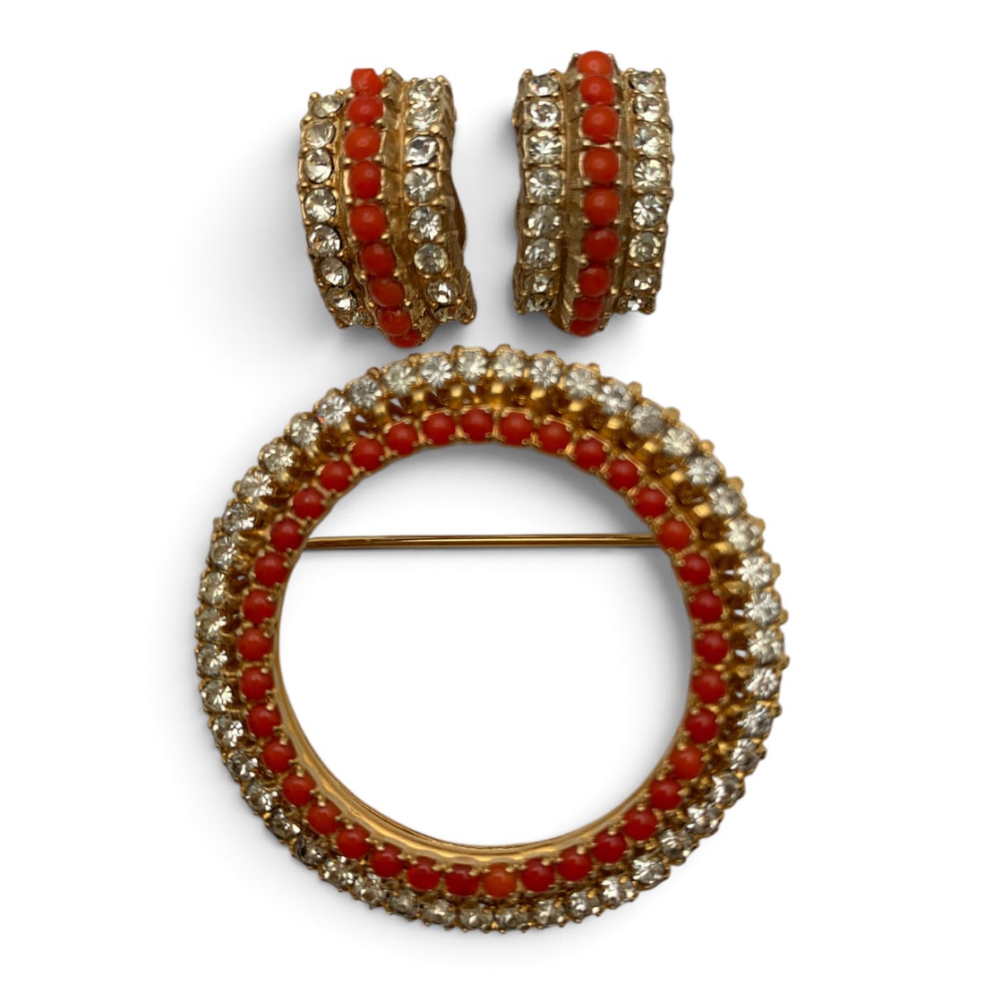Vintage Warner Designer 3 Piece Jewelry Set: Vintage Designer 3 Piece Fashion Jewelry Set Featuring Orange And Clear Stones Including One Brooch Signed Warner And One Pair Of Clip EarringsBrooch: 13/4" LongEarrings: 3/4" Long