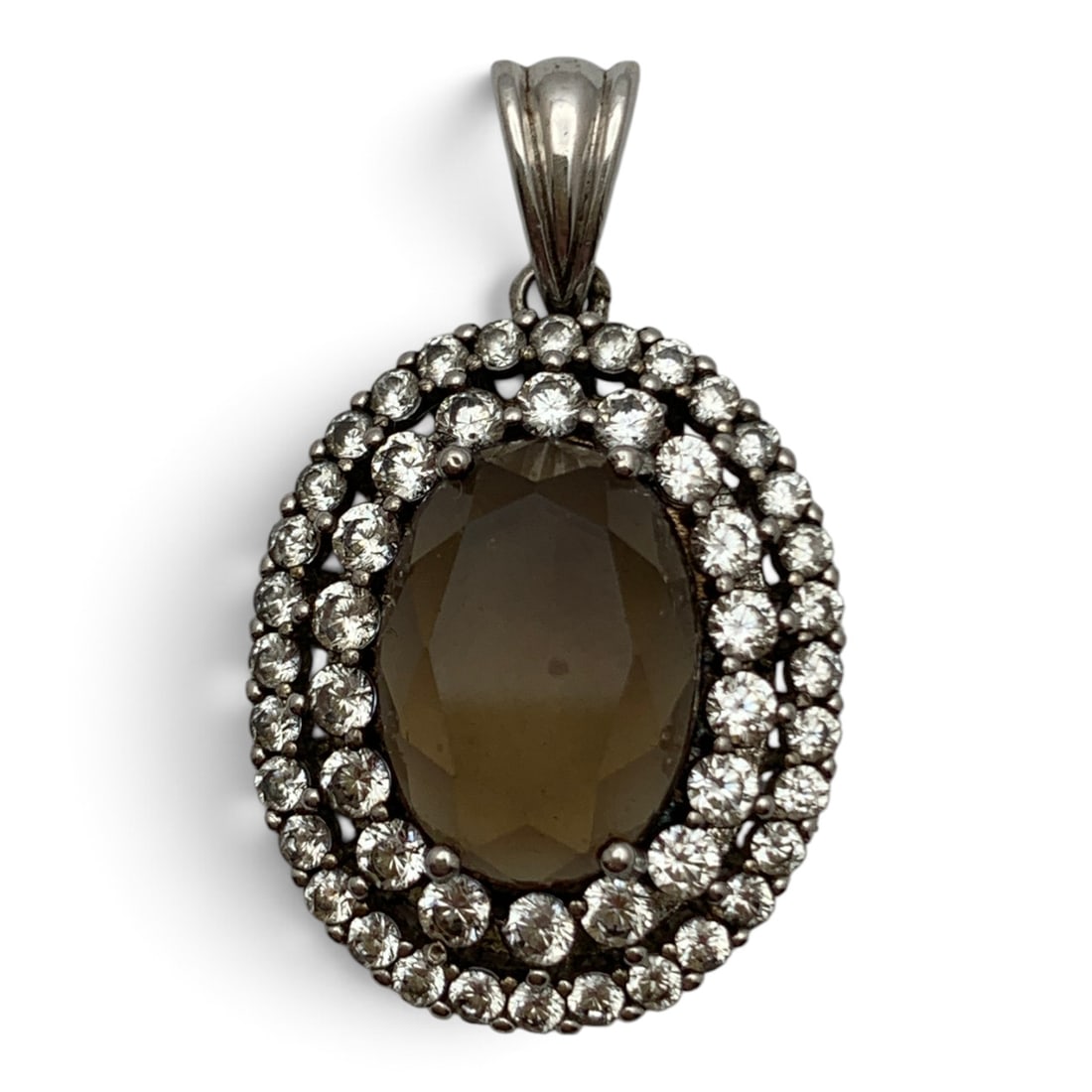 Silver Pendant With Stones: Silver Pendant Featuring A Center Oval Cut Green Stones Surrounded By Clear Stones Tests Silver - 1 1/4" Long - 5.5 Grams