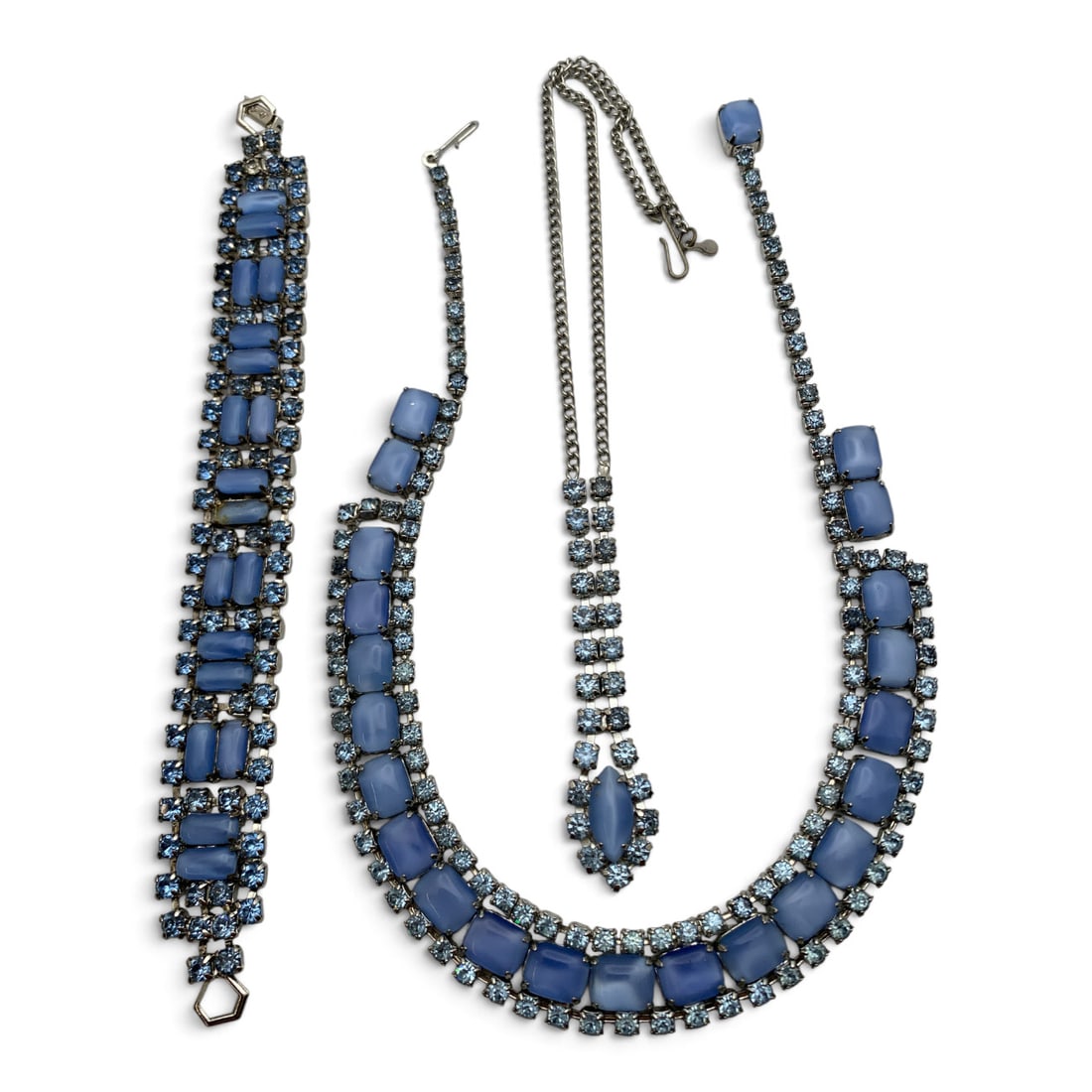 3 Vintage Silver Tone Fashion Jewelry Pieces: 3 Vintage Silver Tone Fashion Jewelry Pieces Including Two Necklaces Featuring Blue Stones And One Bracelet Featuring Blue Stones Signed Lou RelNecklaces: 15 1/2" Long & 16 1/4" LongBracelet: 7 5/8"