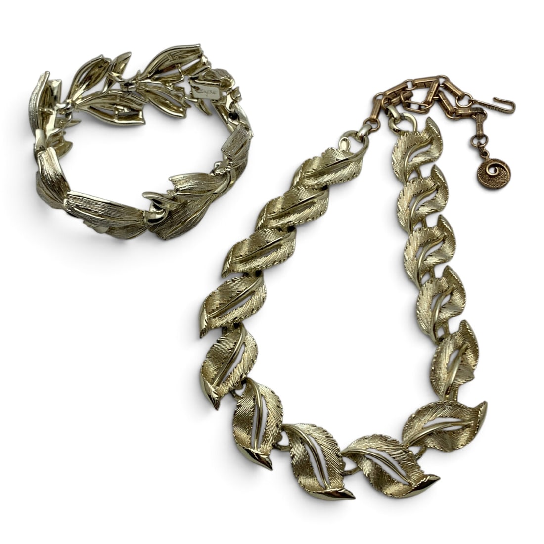 2 Vintage Gold Tone Lisner Fashion Pieces: 2 Vintage Gold Tone Designer Jewelry Pieces Both Marked Lisner Featuring An Open Work Leaf Motif Design Necklace: 17" Long 7" Long