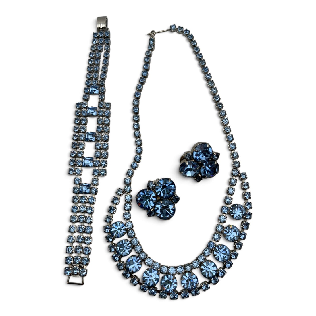 Vintage Silver Tone Fashion Jewelry Set: Vintage Silver Tone Fashion Jewelry Set Featuring Blue Rhinestones Including One Necklace, One Bracelet, And One Pair Of Clip Earrings Necklace: 16" Long Bracelet: 7 1/8" LongEarrings: 7/8" Long