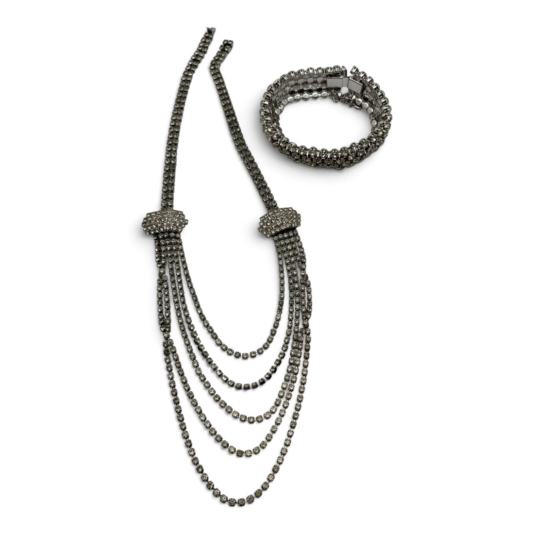 2 Vintage Silver Tone Fashion Jewelry Pieces: 2 Vintage Silver Tone Fashion Pieces Including One Necklace Featuring Clear Rhinestones And One Bracelet Featuring Clear Rhinestones 8" & 18 1/4" Long