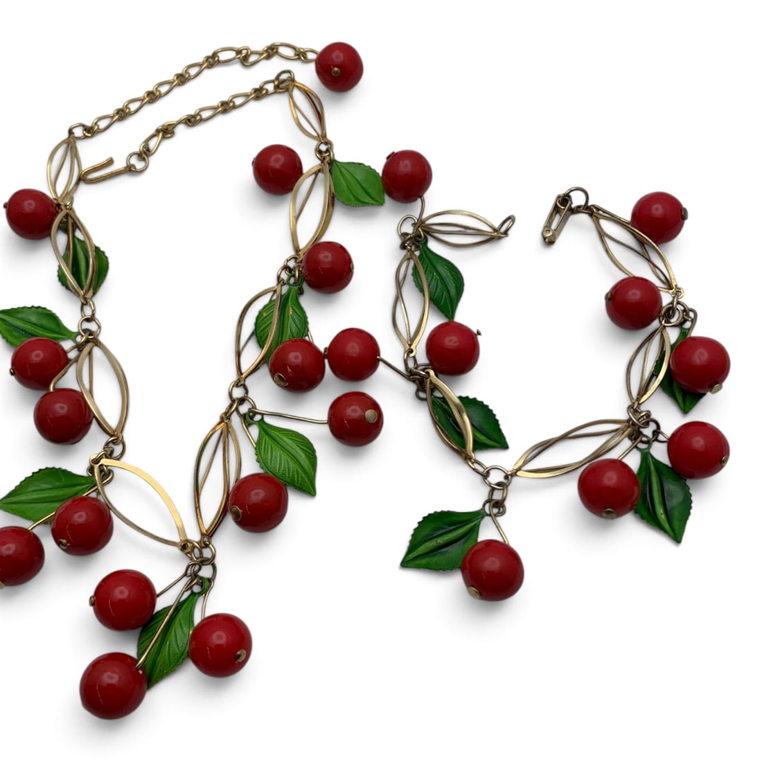 Vintage Cherry Fashion Necklace & Bracelet Set: Vintage Fashion Bracelet & Necklace With A Cherry Charm Design Featuring Green Enamel Leaf Motif WorkBracelet: 9" LongNecklace: 17" Long