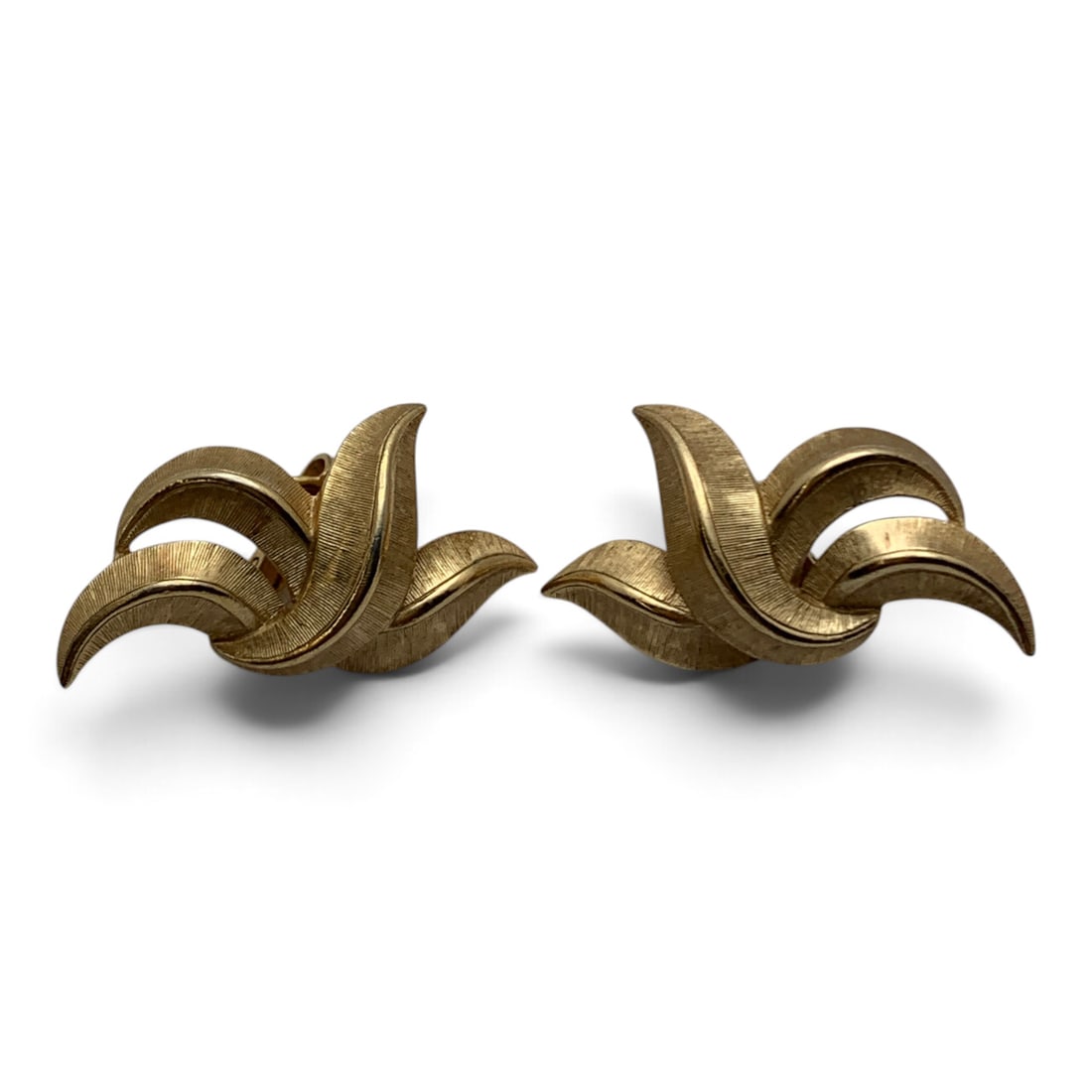 Pair Of Singed Trifari Gold Tone Clip Earrings: Pair Of Signed Trifari Gold Tone Clip Earrings Featuring A Textured Design Marked: Trifari - 1 1/2" Long