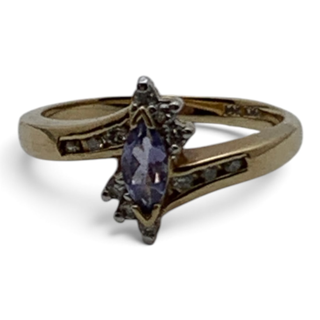 14k Yellow Gold Diamond & Tourmaline Ring: 14k Yellow Gold Ring With A Bypass Design Featuring A Center Set Purple Tourmaline Gemstone Flanked By Round Cut White Diamonds Marked: 14k - Size 7 - 2.1 DwtGemstones Tested With Presidium Gem Tester