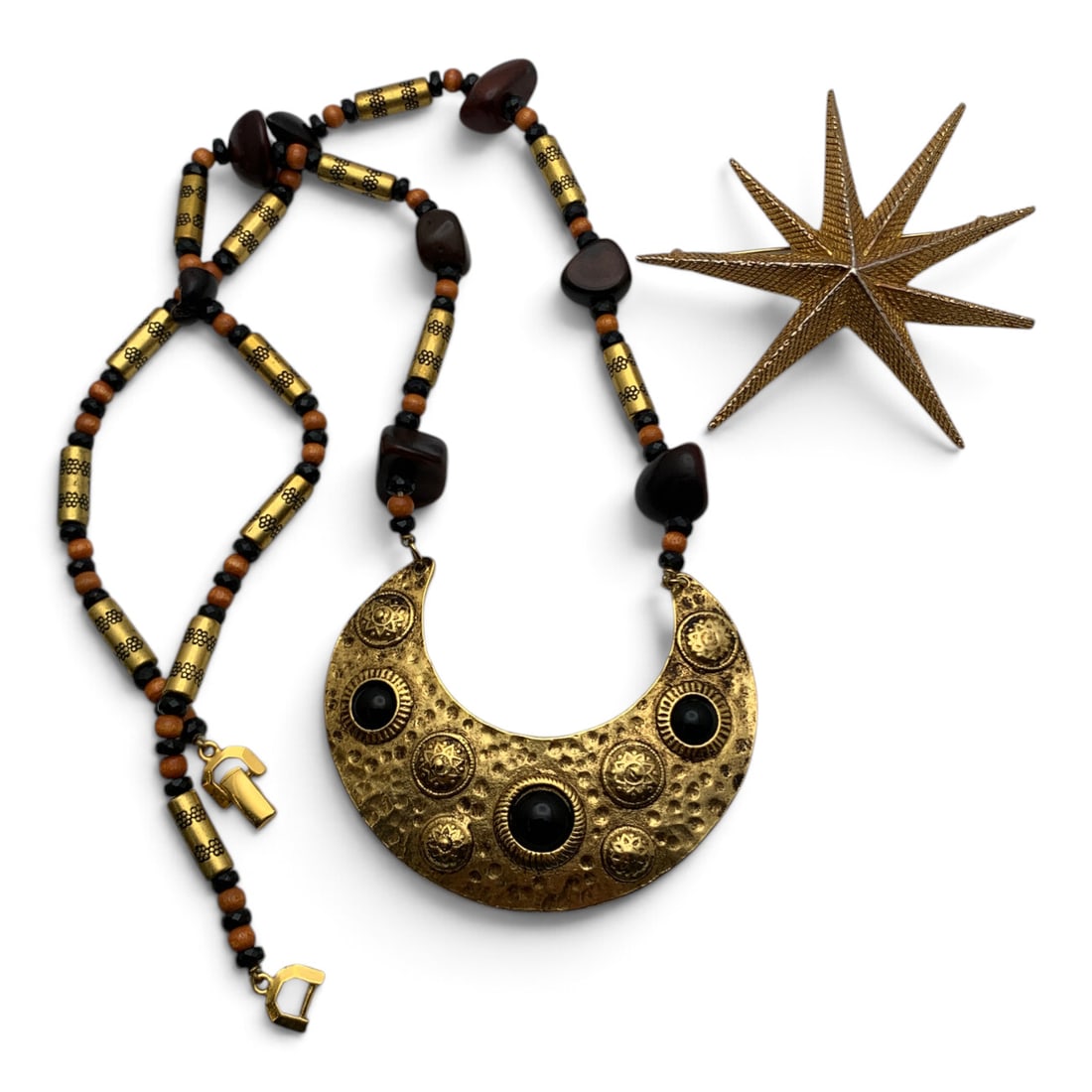 2 Vintage Fashion Jewelry Pieces: 2 Vintage Fashion Jewelry Pieces Including 1 Signed Valentino Moon Motif Fashion Necklace And 1 Gold Tone Star Burst Brooch Necklace Signed On Back: Valentino - 28 1/2" LongBrooch: 3 1/4" Long