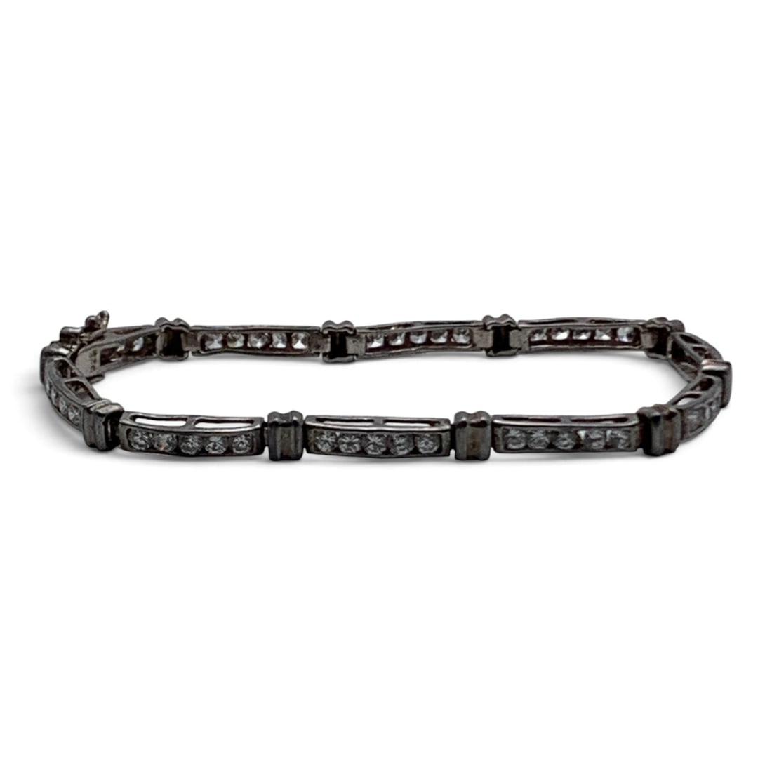 Sterling Silver Bracelet With Clear Stones: Sterling Silver Bracelet Featuring Clear Round Cut Stones Marked: 925 - 7 3/4" Long - 10.4 Grams