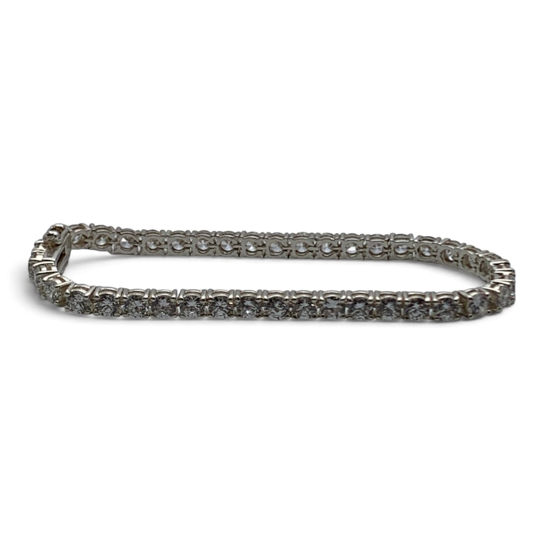 Sterling Silver Bracelet With Clear Stones: Sterling Silver Bracelet Featuring Clear Round Cut Stones Marked: 925 - 7 3/4" Long - 15.0 Grams