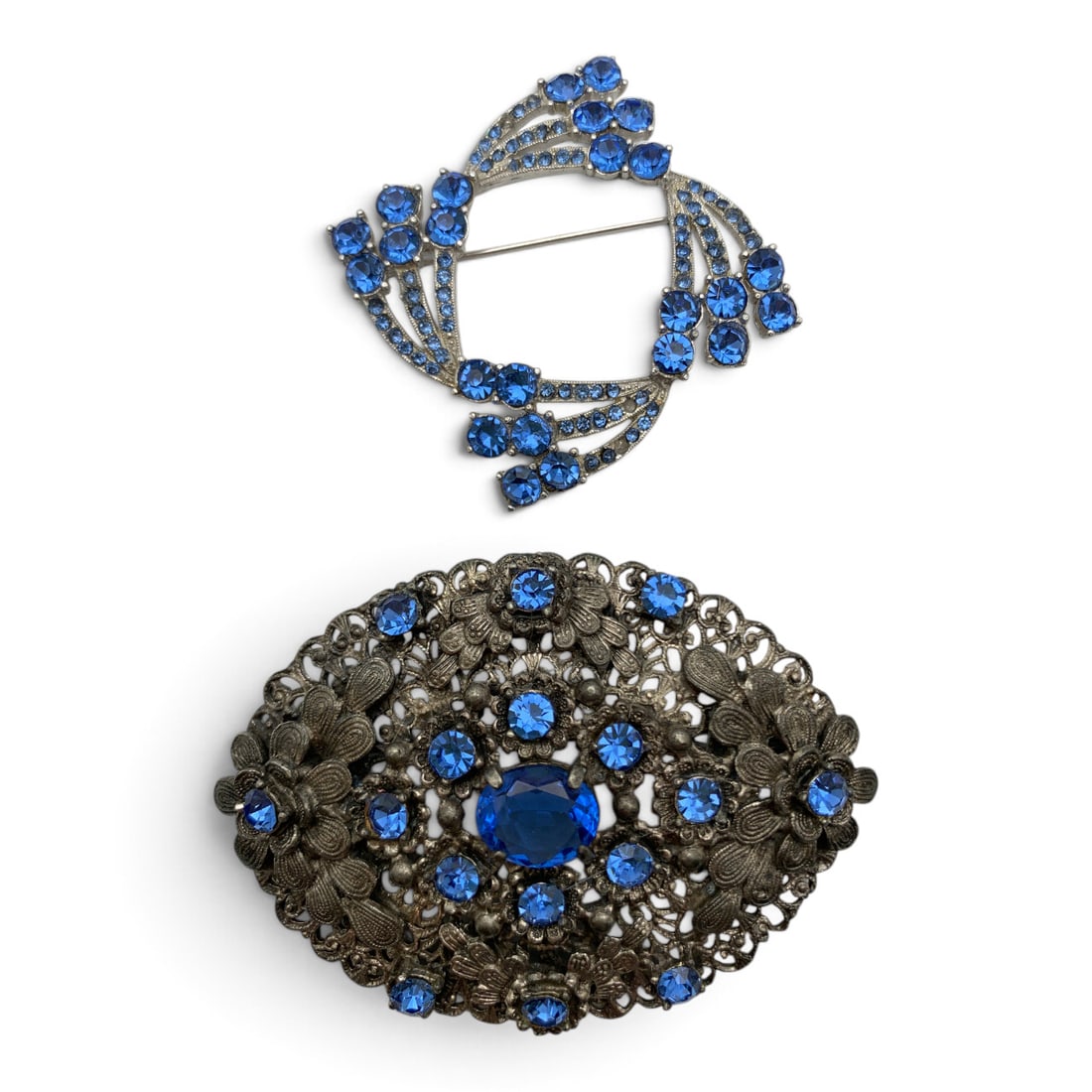 Vintage Silver Tone Rhinestone Brooch: Vintage Silver Tone Floral Brooch Featuring Blue Rhinestones2 3/4" Long
