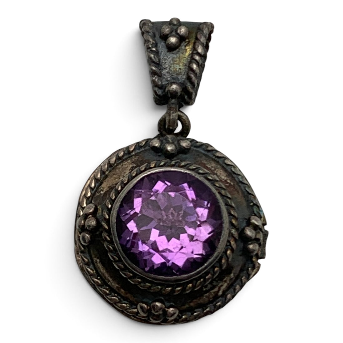 Vintage Sterling & Purple Stone Locket Pendant: Vintage Sterling Silver Locket Pendant Featuring A Center Set Round Cut Purple Gemstone Marked: 925 - 1 1/8" Long - 8.0 Grams
