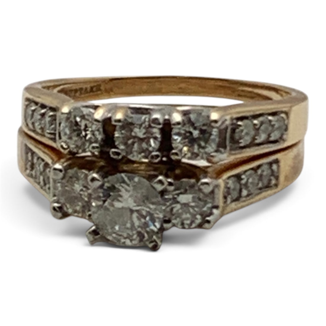 14k Yellow Gold & Diamond Engagement Ring Set: 14k Yellow Gold Engagement Ring Set Featuring One Band Featuring 3 Center Set Round Cut White Diamonds And One Engagement Ring Featuring 3 Center Set Round Cut White Diamonds With One Prominent Diamon