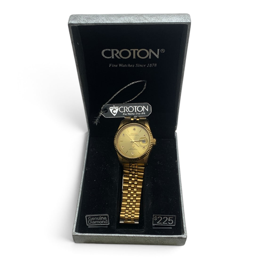 Vintage Croton Gold Tone Wrist Watch: Vintage Croton Gold Tone Wrist Watch Marked On Face: Croton, Diamond Quartz, JapanMarked On Back: Croton, Japan Quartz, 23k Plated, Stainless Steel Back1 3/8" Face DiameterIncludes Original Box