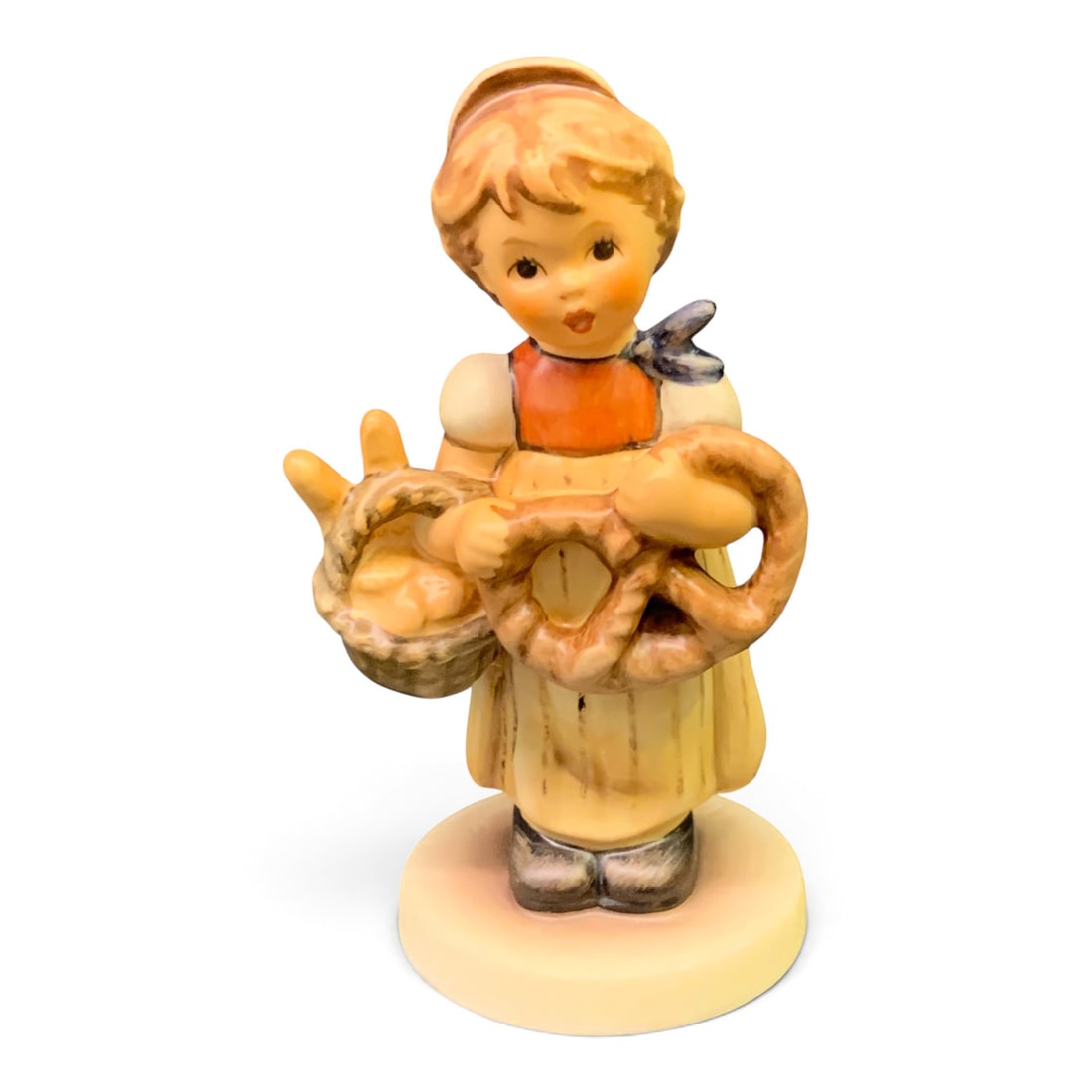Goebel Hummel Figurine, Pretzel Girl: Vintage Western Germany Goebel Hummel Figurine Titled Pretzel Girl Marked On Bottom: Goebel, Germany, First Issue 19994 1/4" Tall