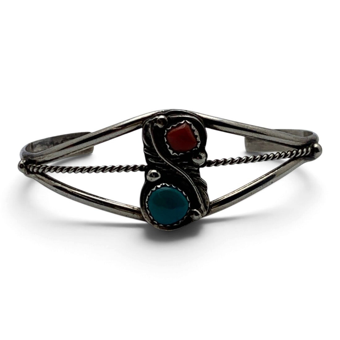 Richard Begay Navajo Sterling Silver Cuff Bracelet: Richard Begay Native American Navajo Sterling Silver Cuff Bracelet Featuring A Blue Turquoise Stone And An Orange Coral Stone With A Feather MotifMarked: R B, Sterling 2 1/4" Inside Width - 11.5 Grams