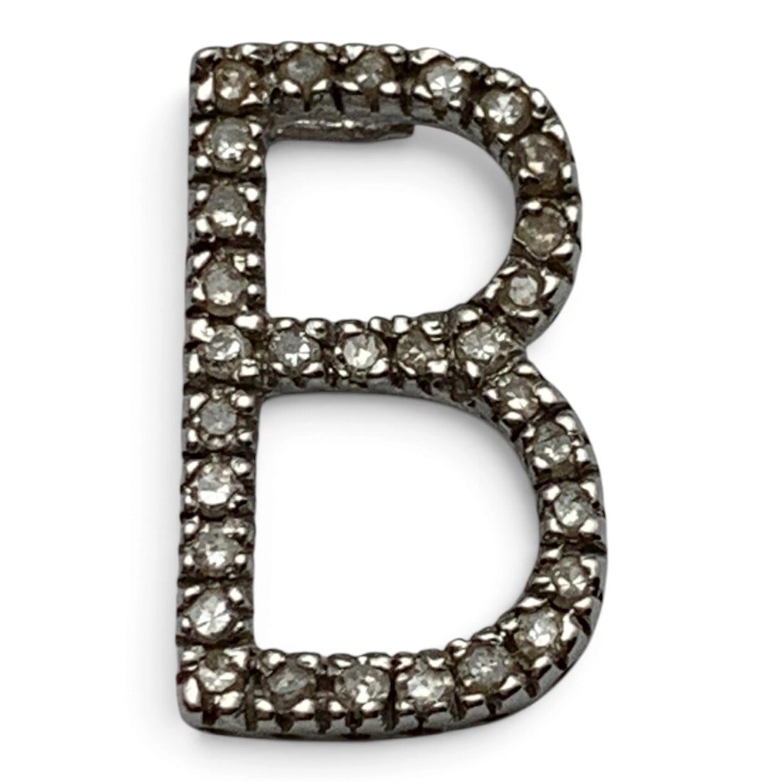 14k White Gold & Diamond Pendant: 14k White Gold " B " Pendant Featuring Round Cut White Diamonds Approx. 0.01ct EachMarked 14k - 5/8" Long - 0.6 DwtGemstones Tested With Presidium Gem Tester Il - Berners Does Not Guarantee