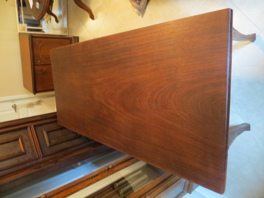 West African Aroco Mahogany Table: West African handcrafted 'Aroco' mahogany table, room for 8, cabriole legs, can be disassembled for transit. Measures 31"w by 71"l by 33.5"h.