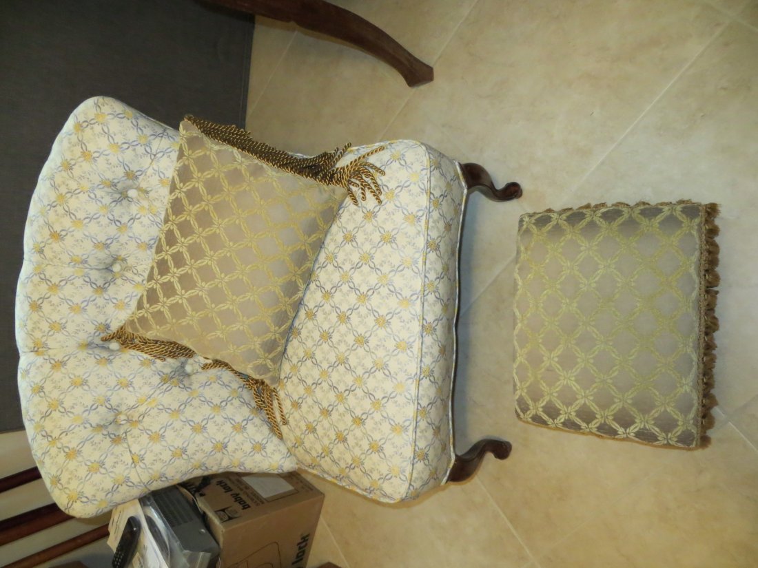Boudoir Chair with Foot Stool: Boudoir chair with pillow and foot stool.