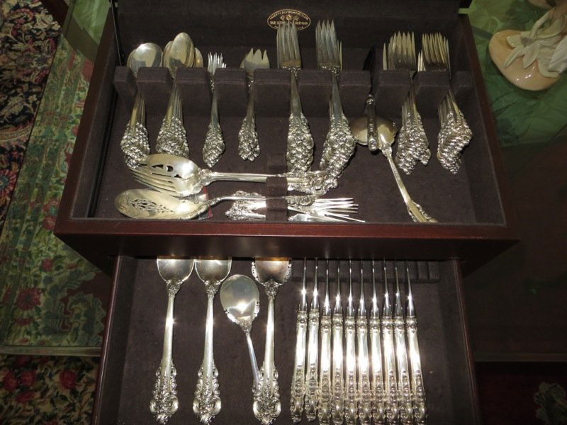 Wallace Sterling Silver 'Grand Baroque' Silverware Set: An American 103-piece sterling silver table service, Wallace Silversmiths, Wallingford, Connecticut, mid-20th century, of Grande Baroque pattern, comprising one ladle, two cake servers, two serving fo