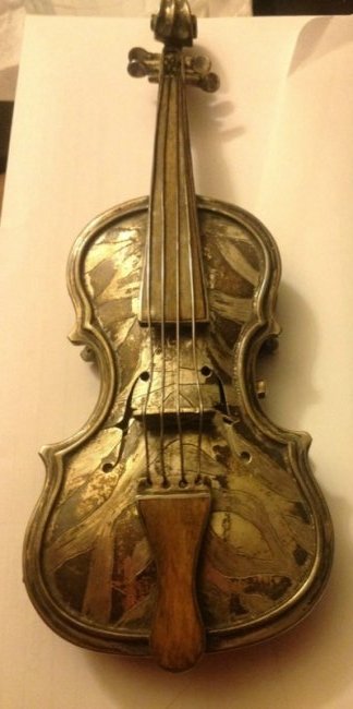 Imperial Russian Faberge Violin-Form Watch & Snuff Case: An Imperial Russian Faberge hallmarked silver violin-form combination watch and snuff case, circa 1880, hand chased and engraved, opening to an inset mid-Victorian pocket watch (with damages) key wind