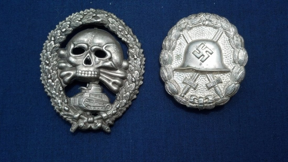 Nazi pre WW2 Condor Legion Wound & Tank Badge set: Very Rare Condor Legion Wound Badge and Nazi Condor Legion Panzer Badge. Both stamped construction. Wound Badge kept in excellent condition by owner until death in 2009. Would badge Awarded during the