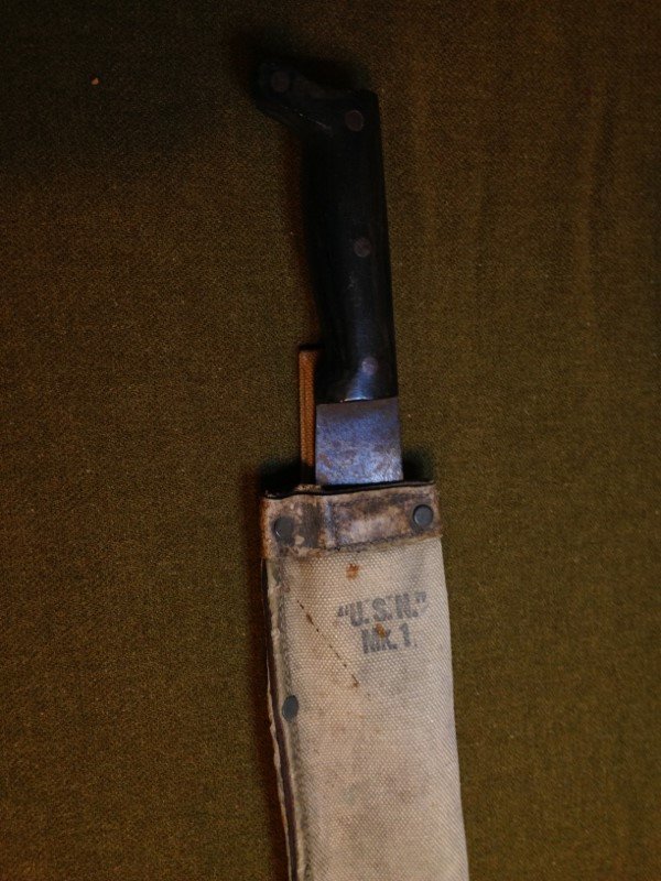 1944 Pacific Theater Machete Blade Marked with Sheath: Original 1944 Dated Machete formally on display at the Hartung Museum outside Chicago, donated by WW2 Pacific Theater Veteran who used this for clearing jungle during combat and non combat operations