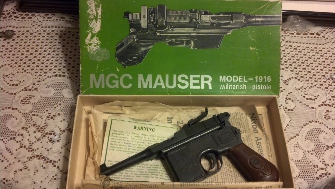 Rare WW2 Mauser Broomhandle Luger Rare Marketing Model!: Extremely rare Broomhandle Mauser Pistol Model used by salesman at Mauser to market this incredible pistol. Fully working display gun aside for having a sealed barrel and no firing pins. Cocking mecha