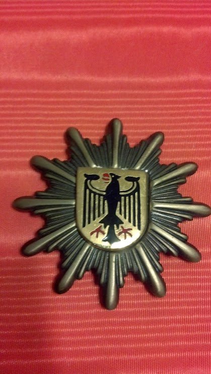 German Police Badge East Germany: Original East German Police Badge from Officer who served under the Nazi party during WW2 and then for the East Berlin Police. Excellent shape and nice piece of Western European History.