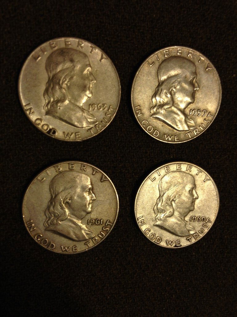 Estate Lot 4 Franklin 90% Silver Half Dollars U.S.: Four slightly circulated Franklin 90% Silver Half Dollars from a beautiful New England Estate. Tangible Silver great for investing! Bidding starts at just under melt, remember we have 0% Buyers Premiu